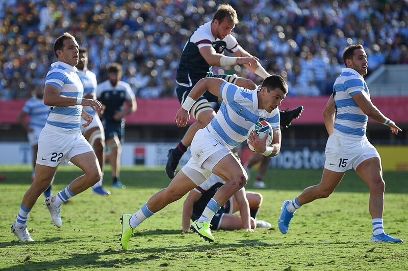 Argentina's scrum-half Gonzalo Bertranou (C) runs to score a try during the Japan 2019 Rugby World Cup Pool C match between Argentina and the United States at the Kumagaya Rugby Stadium in Kumagaya. AFP
