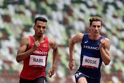 France's Pierre-Ambroise Bosse, right, and Morocco's Oussama Nabil compete in the men's 800m heats.