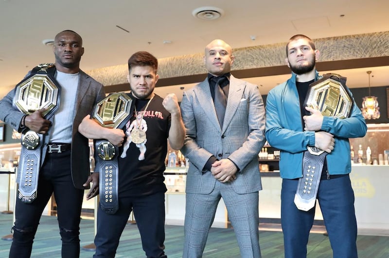 Ali Abdelaziz, centre right, standing alongside three of his UFC champion fighters, Kamaru Usman, left, Henry Cejudo, second left, and Khabib Nurmagomedov, right. Courtesy Ali Abdelaziz