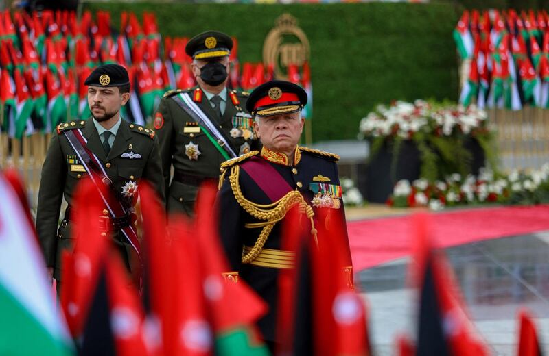 A handout picture released by the Jordanian Royal Palace on April 11, 2021 shows Jordanian King Abdullah II (front), accompanied by his son Crown Prince Hussein (behind L) and the chairman of the Joint Chiefs of Staff of the Jordanian Armed Forces (JAF) General Yousef Huneiti (behind R), arriving at the Martyr’s Memorial in the capital Amman during an official ceremony marking the kingdom's centennial anniversary. Jordan on April 11 marked 100 years of survival as a resource-poor country in a war-ravaged neighbourhood. On April 11, 1921, the current king's great-grandfather Abdullah became ruler of the newly created Emirate of Transjordan. - RESTRICTED TO EDITORIAL USE - MANDATORY CREDIT "AFP PHOTO / JORDANIAN ROYAL PALACE / YOUSEF ALLAN" - NO MARKETING NO ADVERTISING CAMPAIGNS - DISTRIBUTED AS A SERVICE TO CLIENTS
 / AFP / Jordanian Royal Palace / - / RESTRICTED TO EDITORIAL USE - MANDATORY CREDIT "AFP PHOTO / JORDANIAN ROYAL PALACE / YOUSEF ALLAN" - NO MARKETING NO ADVERTISING CAMPAIGNS - DISTRIBUTED AS A SERVICE TO CLIENTS
