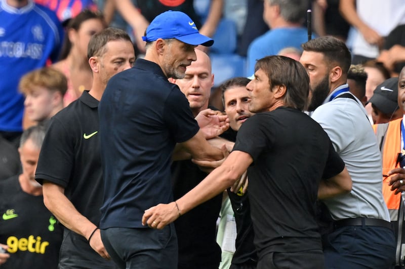 Tottenham coach Antonio Conte, right, and Thomas Tuchel were involved in an ugly clash at Stamford Bridge on August 14, 2022. AFP