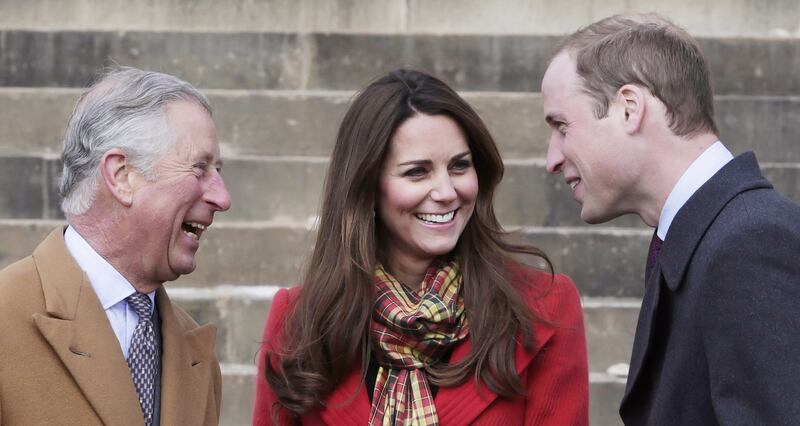 Prince Charles, Kate, and Prince William share a joke on a visit to Dumfries House in Scotland in March 2013.