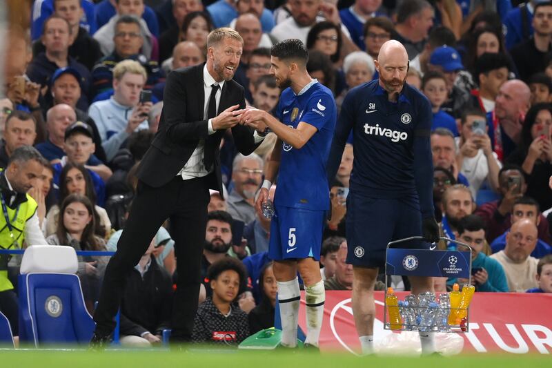 Chelsea manager Graham Potter giving instructions to Jorginho. Getty