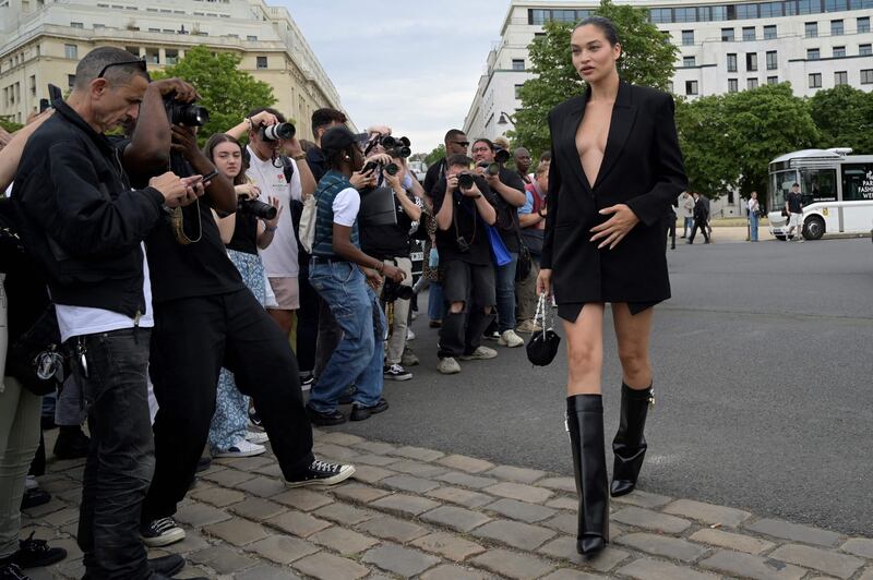 Australian model Shanina Shaik arrives to attend the Givenchy show. AFP