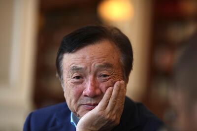 In this Aug. 20, 2019, photo, Huawei's founder and CEO Ren Zhengfei pauses during conversation with colleagues at the Huawei campus in Shenzhen in Southern China's Guangdong province. Ren said that U.S. restrictions on access to technology would not defeat the Chinese telecom equipment maker and that the United States and Australia should hold off on buying Huawei's 5G network gear if they fear it is a security risk. (AP Photo/Ng Han Guan)