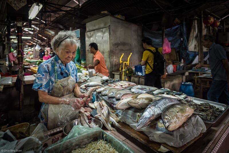 'The Sole Lady Elderly Fishmonger' by Chua Bing Guan (Malaysia) - Pink Lady Food Photographer of the Year (South East Asia) category