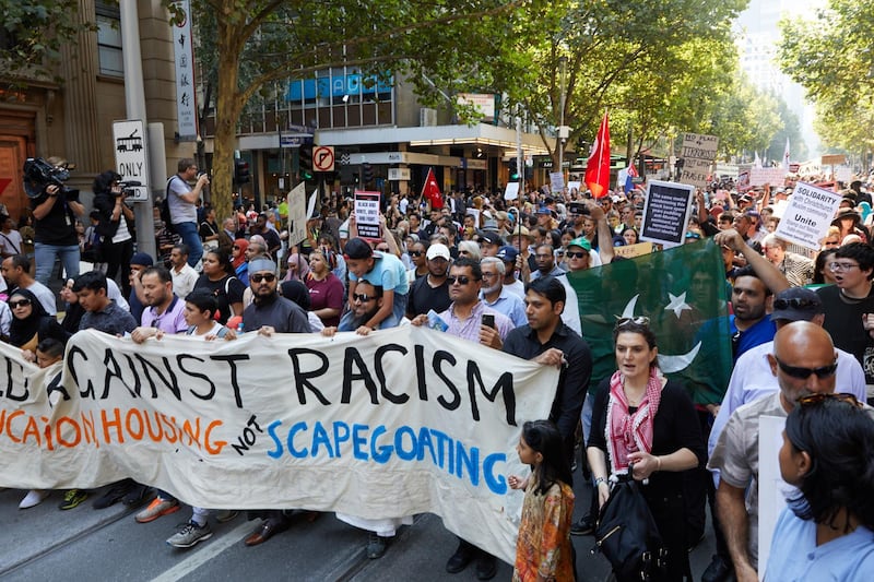 epa07441376 Demonstrators take part in an anti-racist and anti-fascist rally against Islamophobia in Melbourne, Australia, 16 March 2019. At least 49 people were killed by a gunman, believed to be Brenton Harrison Tarrant, and 20 more injured and in critical condition during the terrorist attacks against two mosques in New Zealand during Friday prayers on 15 March.  EPA/ERIK ANDERSON AUSTRALIA AND NEW ZEALAND OUT