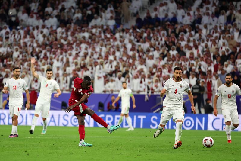  Almoez Ali tucks away the winner for Qatar. Getty Images