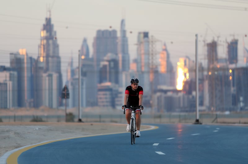 DUBAI , UNITED ARAB EMIRATES – Dec 18 , 2015 : One of the cyclist at Nad Al Sheba Cycle track in Dubai. ( Pawan Singh / The National ) For News. ID number is : 49513 *** Local Caption ***  PS1812- EXERCISE03.jpg