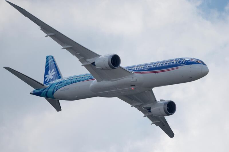 An Air Tahiti Nui Boeing 787-9 performs its flying display at the International Paris Air Show on June 17, 2019 at Le Bourget Airport, near Paris. (Photo by ERIC PIERMONT / AFP)