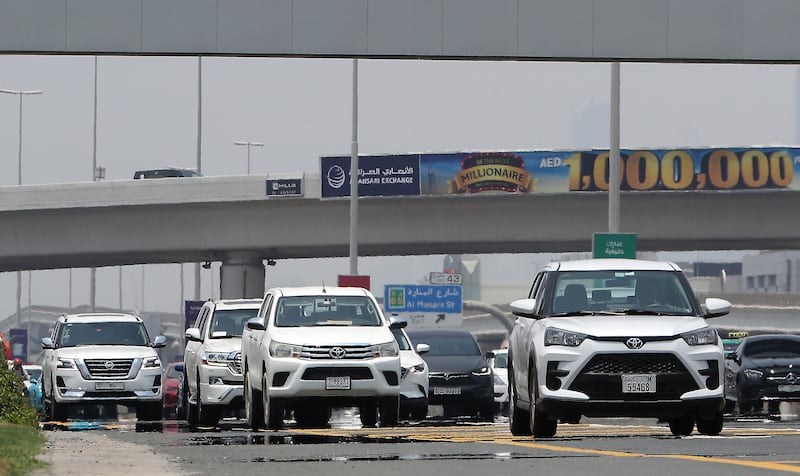 Motorists navigate the Sheikh Zayed Road on a hot June day in Dubai. Pawan Singh / The National