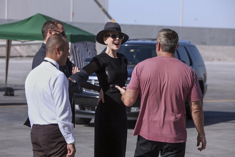 Australian actress Nicole Kidman, chats with guests and staff during a break from shooting a new advertisement for Etihad Airways at the Abu Dhabi International Airport.