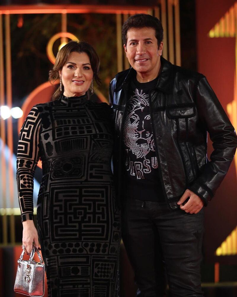 Actor and comedian Hany Ramzy donned a cool leather jacket and a Versace t-shirt to walk the red carpet with his wife, Mona Mohab, for the premiere of ‘Wadi El Gin’. Instagram