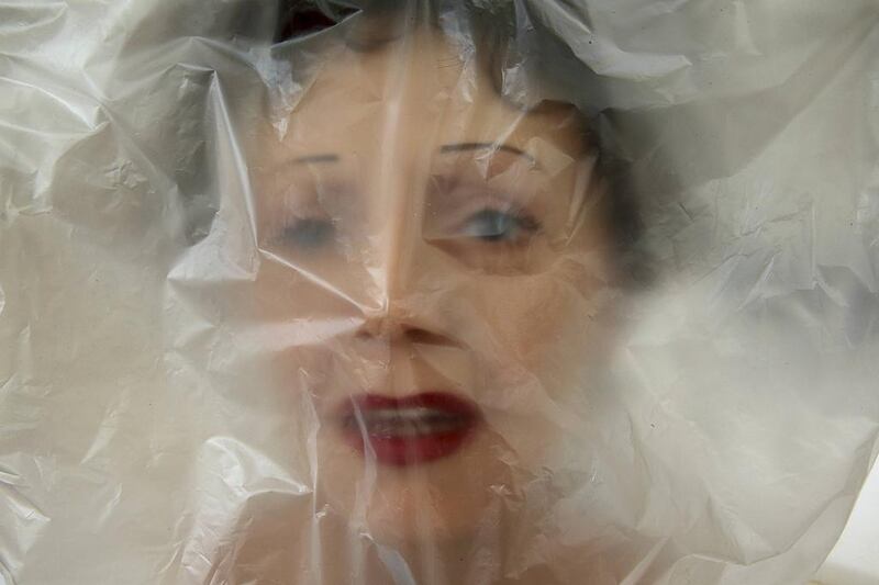 The head of Edith Piaf's wax statue is wrapped in plastic at the Paris Grevin Wax Museum's workshop before it is shipped to Prague for the opening of their new museum. Reuters 