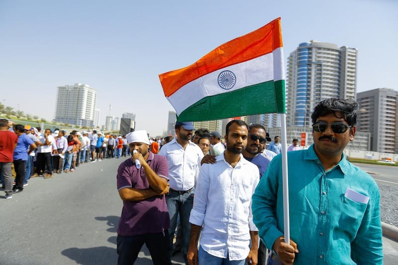Indians queue to hear Mr Modi speak at the Dubai International Cricket Stadium. Pawan Singh / The National