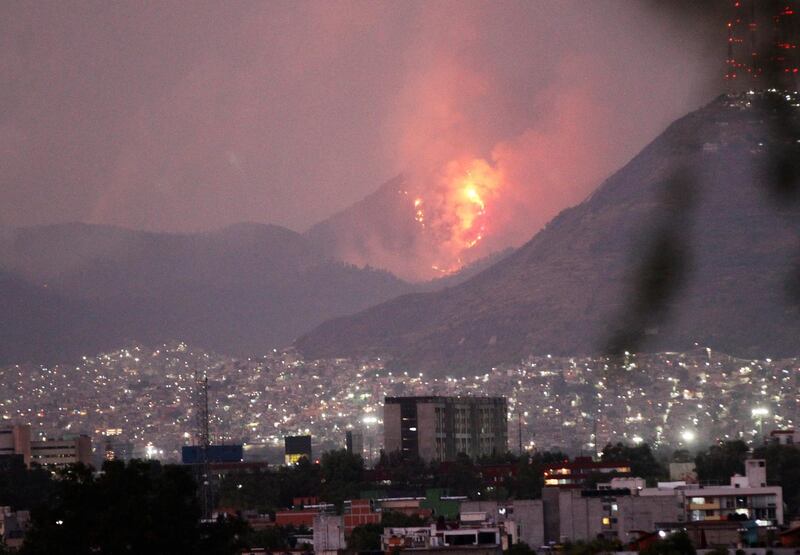 A forest fire burns on a hill north of Mexico City. AP Photo