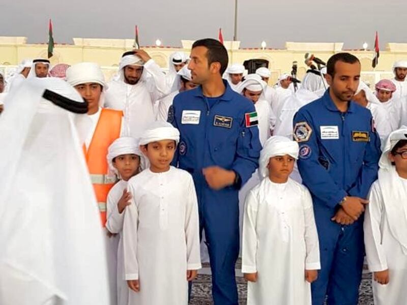 Dr Al Neyadi, pictured with his nephew, Mohammed Saif Al Neyadi, standing slightly in front of him, at an astronaut event also attended by Hazza Al Mansouri. Photo: Al Sanawbar School
