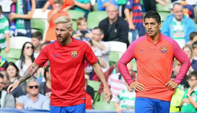 Barcelona's Lionel Messi and Luis Suarez before their friendly against Celtic in Dublin on Saturday. Paul Faith / AFP / July 30, 2016 
