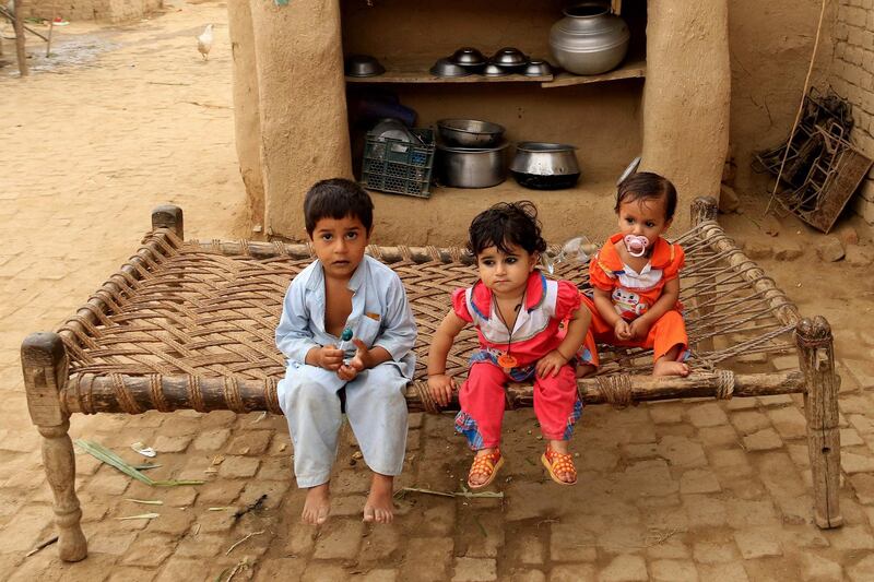 Afghan refugees in Peshawar. More than 73 per cent of refugees live in neighbouring countries, the UNHCR says. EPA