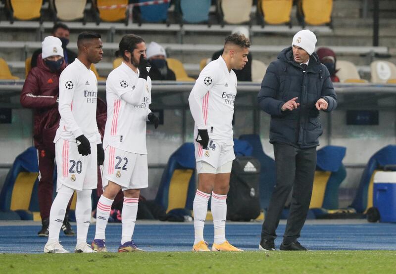 Real Madrid manager Zinedine Zidane gives instructions to substitutes Mariano, Isco and Vinicius Junior during the Champions League defeat against against Shakhtar Donetsk. Reuters