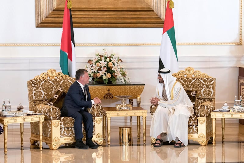 ABU DHABI, UNITED ARAB EMIRATES - February 07, 2018: HH Sheikh Mohamed bin Zayed Al Nahyan Crown Prince of Abu Dhabi Deputy Supreme Commander of the UAE Armed Forces (R), meets with HM King Abdullah II, King of Jordan (L), during a reception at the Presidential Airport.

( Hamad Al Kaabi / Crown Prince Court - Abu Dhabi )
—