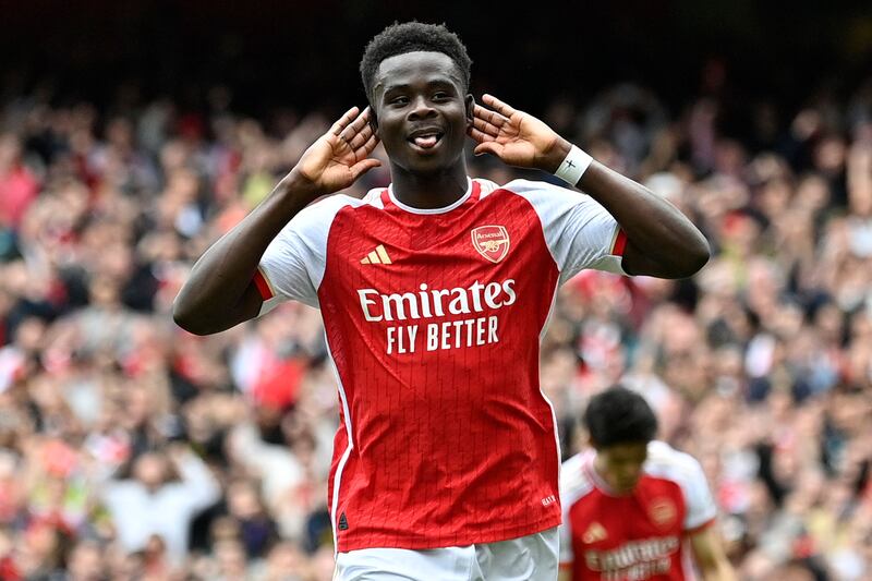 Arsenal's Bukayo Saka celebrates scoring the opener, his 20th goal of the season across all competitions and his 16th in the Premier League. AFP