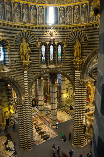 SIENA, ITALY - APRIL 05:  A general view from the passageway under the roof  seen during the press preview of "La Porta del Cielo" at Duomo on April 5, 2013 in Siena, Italy. The newly launched "Door to Heaven" from April 6th will allow visitors to enjoy a spectacular new view of the Duomo and the city of Siena. (Photo by Marco Secchi/Getty Images)