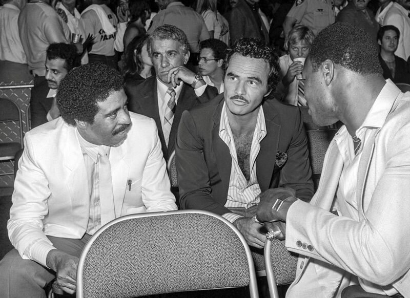 Comedian Richard Pryor, left, and Burt Reynolds chat at the Sugar Ray Leonard-Thomas Hearns middleweight title boxing match at Caesars Palace Las Vegas on  September 16, 1981. Reuters