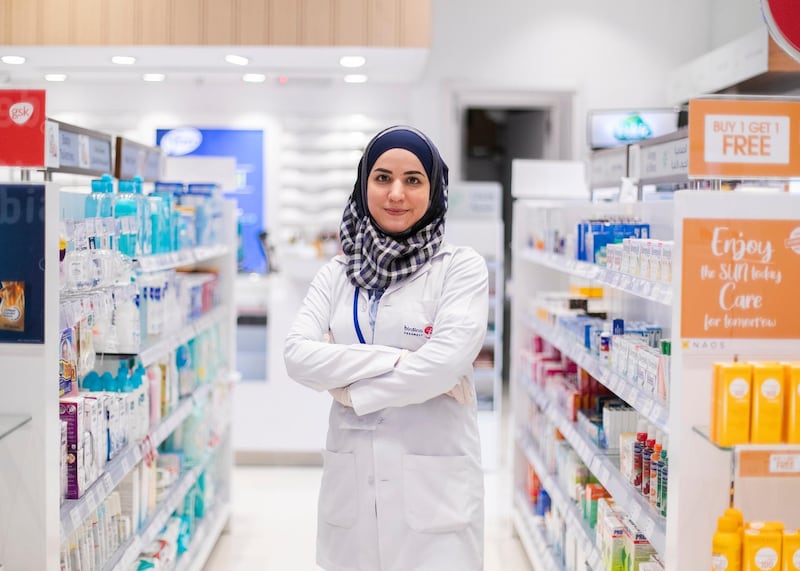 DUBAI, UNITED ARAB EMIRATES. 24 MARCH 2020. 
Leen Fares, pharmacist from Syria. 

Due to shortages, the shop is currently out of masks, but she is taking all precautionary measures to keep herself and her clients safe. She keeps distance and sterilizes every few hours. 
(Photo: Reem Mohammed/The National)

Reporter:
Section: UAE HEROES