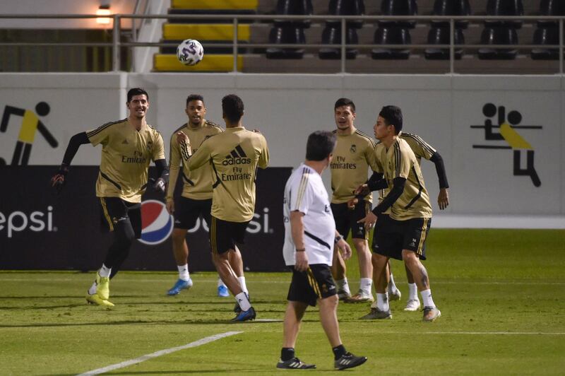 Real Madrid's players attend a training session on the eve of the Spanish Super Cup final. AFP