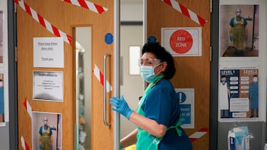 A nurse enters the Covid-19 Red Zone at Glan Clwyd Hospital, in Rhyl, Wales, in May 2020. Getty Images