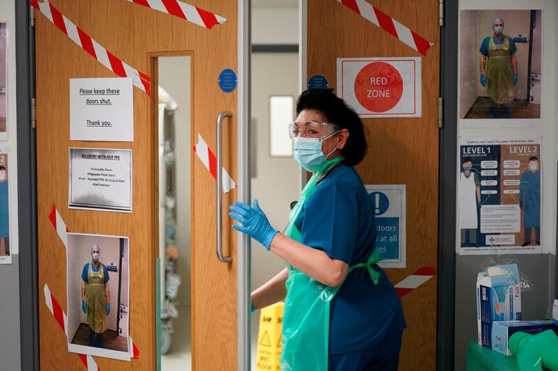 A nurse enters the Covid-19 Red Zone at Glan Clwyd Hospital, in Rhyl, Wales, in May 2020. Getty Images