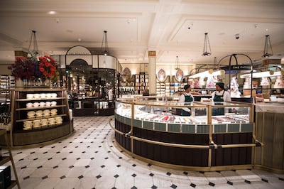 The roastery and patisserie sections sit on a tiled floor in the food hall at the luxury department store Harrods Ltd. in London, U.K., on Wednesday, Jan. 10, 2018. The historic London store has just completed the first stage of a two-year project to transform its food halls, opening the new Roastery and Bake Hall and serving some of the best bread, cakes and coffee in town. Photographer: Chris Ratcliffe/Bloomberg