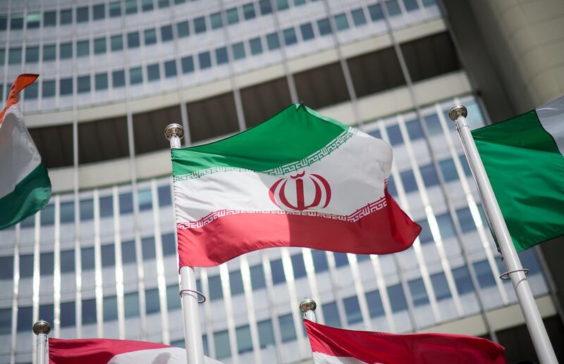VIENNA, AUSTRIA - MAY 24: The flag of Iran is seen in front of the building of the International Atomic Energy Agency (IAEA) Headquarters ahead of a press conference by Rafael Grossi, Director General of the IAEA, about the agency's monitoring of Iran's nuclear energy program on May 24, 2021 in Vienna, Austria. The IAEA has been in talks with Iran over extending the agency's monitoring program. Meanwhile Iranian and international representatives have been in talks in recent weeks in Vienna over reviving the JCPOA Iran nuclear deal. (Photo by Michael Gruber/Getty Images)