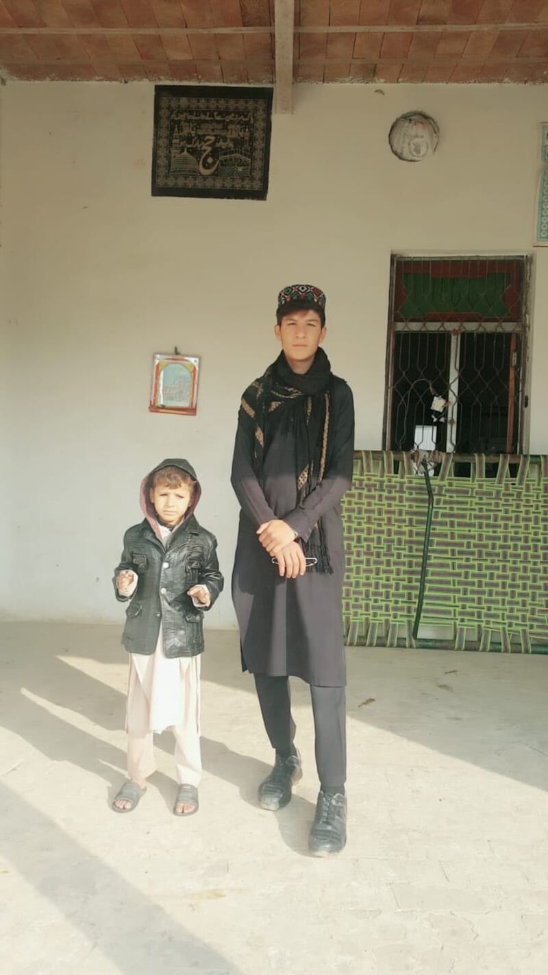 Amir Ahmed, who shares his father Mamoor Khan's passion for education and wants to become a doctor, with his youngest brother Mukhsin.