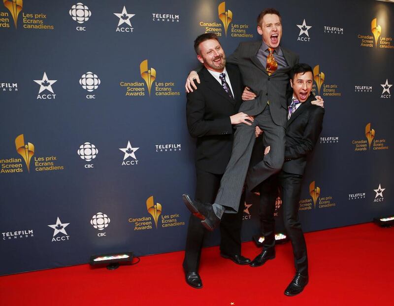 Kyle Tingley, Actor Gavin Crawford, and Andrew Cheng. Mark Blinch / Reuters