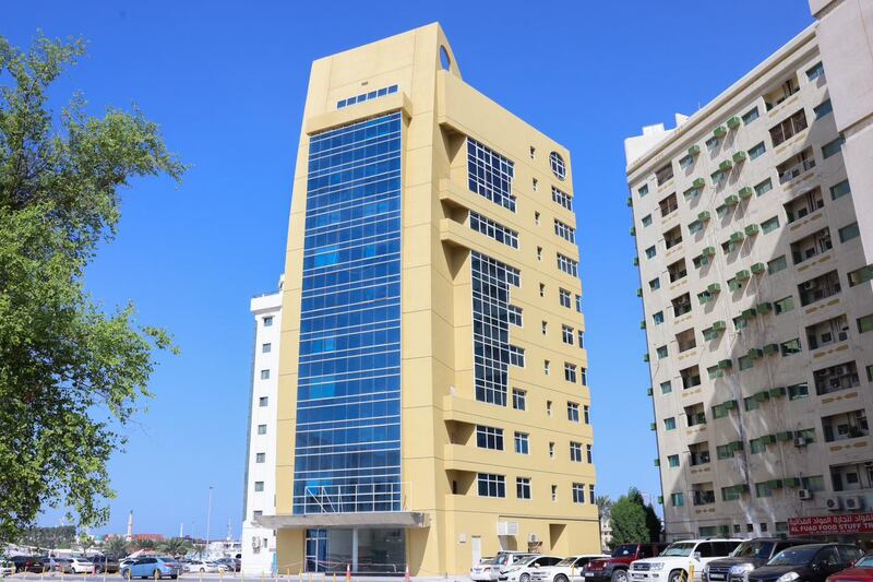 Sharjah Municipality has removing hazardous cladding from one of 40 buildings earmarked for the first phase of a major fire safety scheme. Photo: Sharjah Municipality