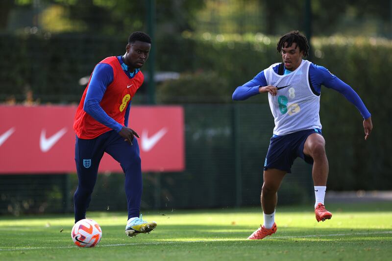 Marc Guehi and Trent Alexander-Arnold of England during a training session at St George's Park on September 24, 2022 in Burton upon Trent, England. Getty