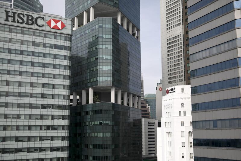 The HSBC Building, left, stands next to commercial buildings in Singapore, on Monday, June 11, 2018. President Donald Trump is about to see whether his bet on North Korea will pay off: that Kim Jong Un’s desire to end his country’s economic strangulation and pariah status will prevail over the dictator’s fear of relinquishing his nuclear threat.  Photographer: Brent Lewin/Bloomberg
