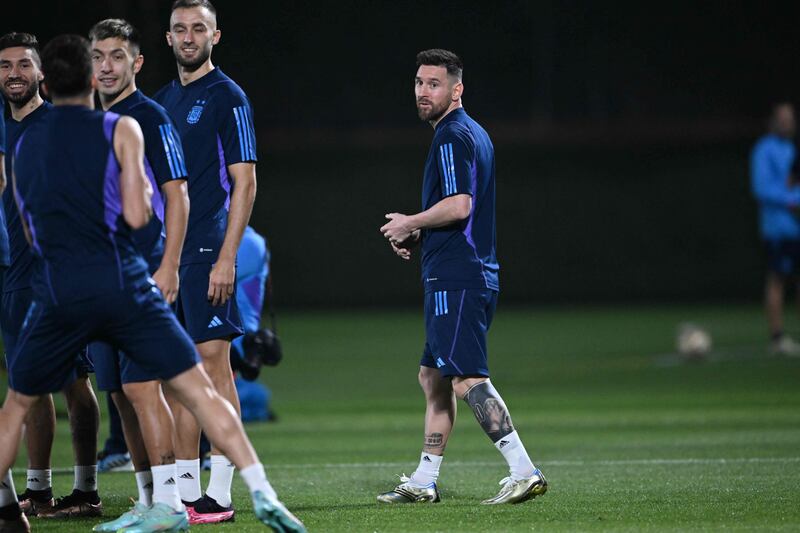 Lionel Messi takes part in a training session at Qatar University. AFP