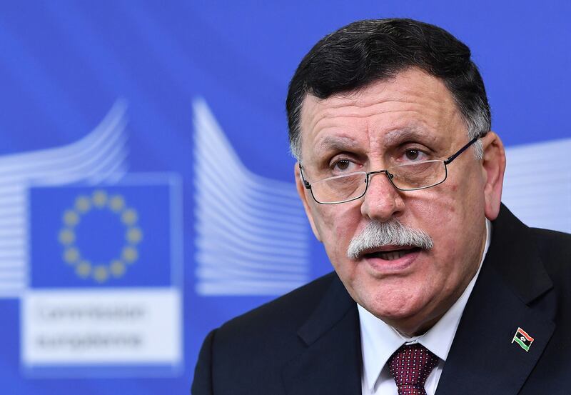 Libya's Prime Minister, Fayez al-Sarraj, addresses a joint press conference with European Commission foreign policy chief at the European Commission in Brussels. Emmanuel Dunand / AFP