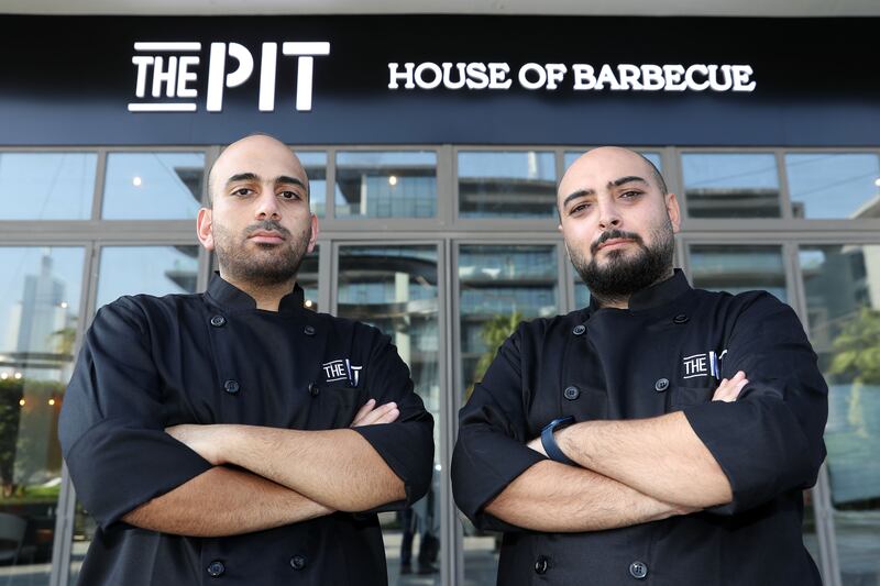 The Pit-House of Barbecue's co-founder Ahmed Hijazi, left, and Ahmad Al Dada, managing partner of the UAE branch. All photos: Chris Whiteoak / The National