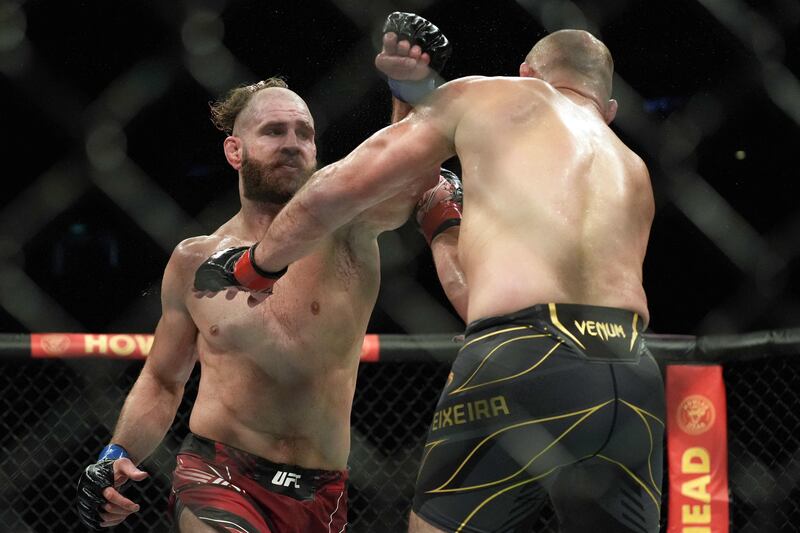 Jiri Prochazka throws a punch at Glover Teixeira during their light heavyweight title fight at UFC 275. AFP