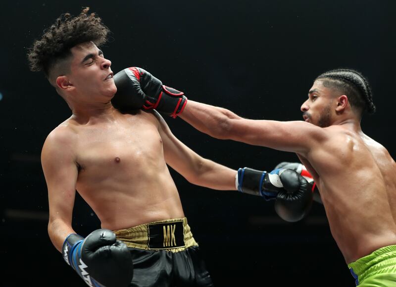 Mohamed Khalid (blue gloves) takes on 3bidaan (red gloves) at the Social Knockout at the Coca-Cola Arena in Dubai.