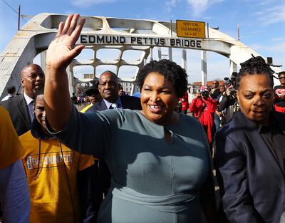 Former candidate for Georgia governor Stacey Abrams crosses the Edmund Pettus Bridge during Selma's re-enactment of Bloody Sunday on Sunday, March 1, 2020, in Selma, Ala. (Curtis Compton/Atlanta Journal-Constitution/TNS/ABACAPRESS.COM)No Use France Digital. No Use France Print.