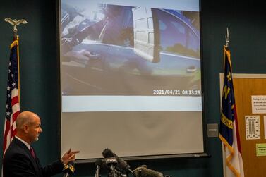 Pasquotank County District Attorney Andrew Womble shows still images from police body camera footage from the fatal shooting of Andrew Brown. AP