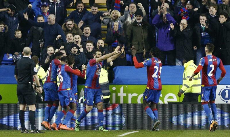 Crystal Palace players celebrate after a goal in their FA Cup win over Reading on Friday. Eddie Keogh / Reuters / March 11, 2016 