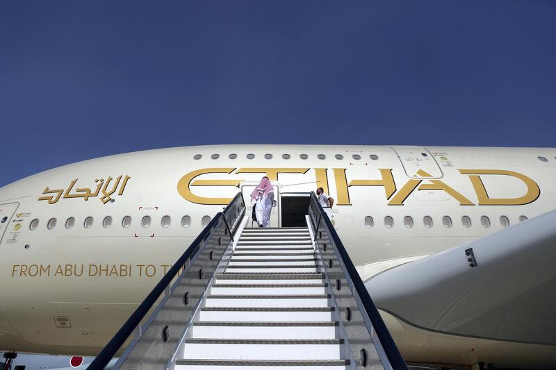 FILE: An attendee enters an Airbus SE A380 passenger aircraft, operated by Etihad Airways PJSC, during the 15th Dubai Air Show at Dubai World Central (DWC) in Dubai, United Arab Emirates, on Monday, Nov. 13, 2017. Airbus SE decided to stop making the A380 double-decker after a dozen years in service, burying a prestige project that won the hearts of passengers and politicians but never the broad support of airlines that instead preferred smaller, more fuel-efficient aircraft. Production of the jumbo jet will end by 2021, after the A380’s biggest customer, Emirates, and a handful of remaining buyers receive their last orders. Photographer: Natalie Naccache/Bloomberg