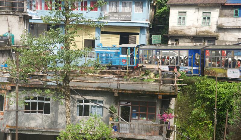 The 'toy trains' – so-called because of their dinky size – pass through settlements and hug cliff edges on the journey between Darjeeling and the city of Siliguri