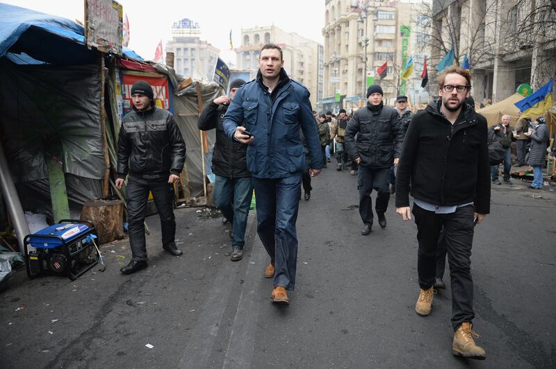 Then opposition leader Klitschko arrives to address anti-government demonstrators at Independence Square in Kiev, 2014. Getty Images